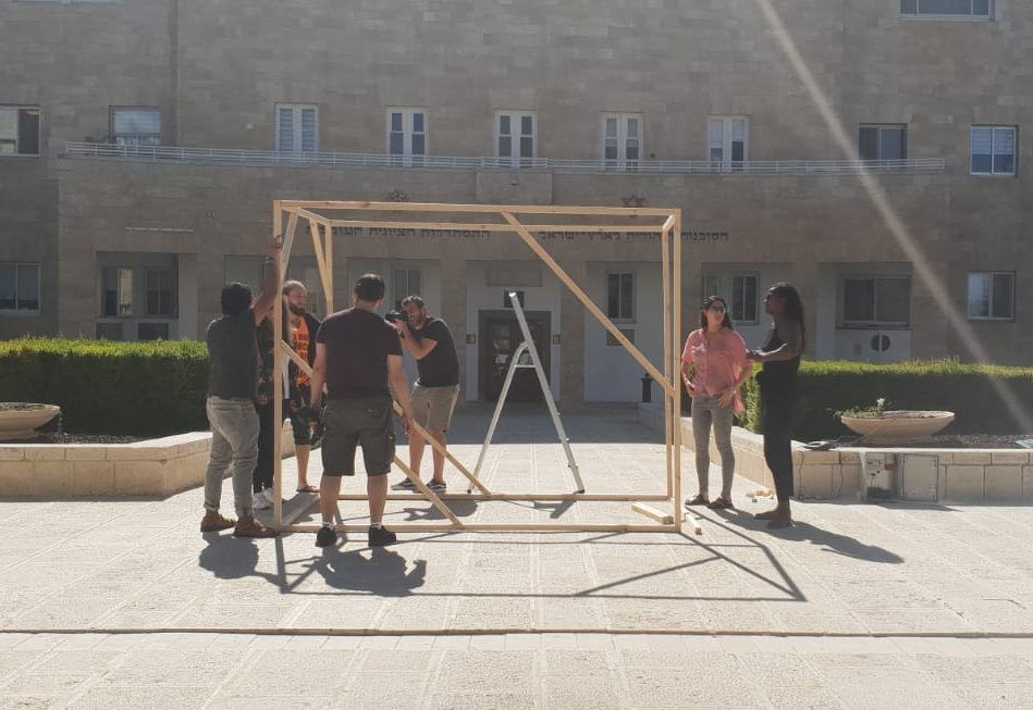 New olim come together to build Sukkah