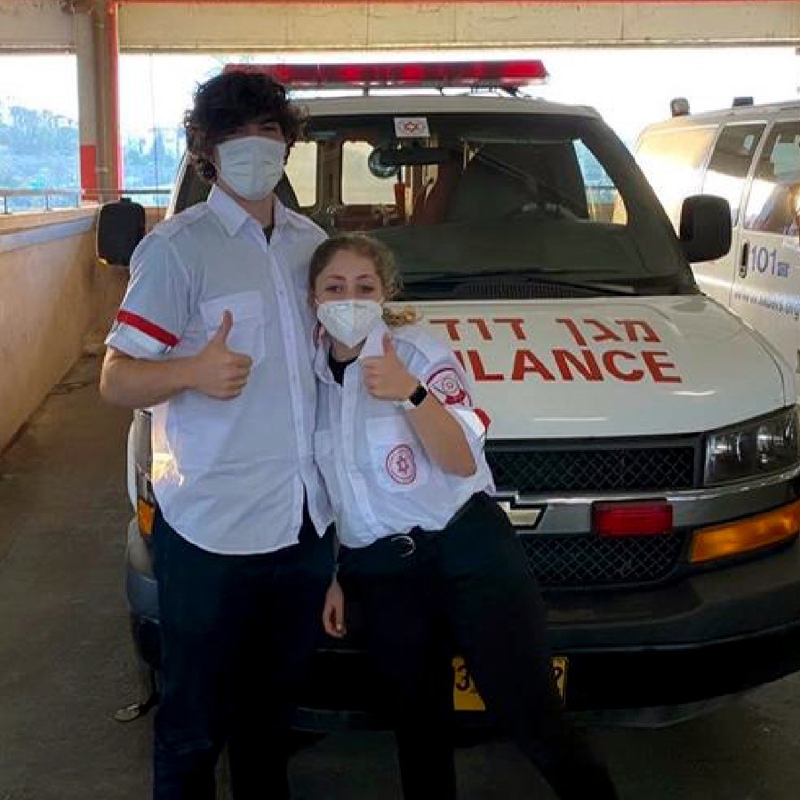 judah in front of ambulance