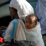 Ethiopian mom and baby land in Israel Ethiopian mom and baby land in Israel
