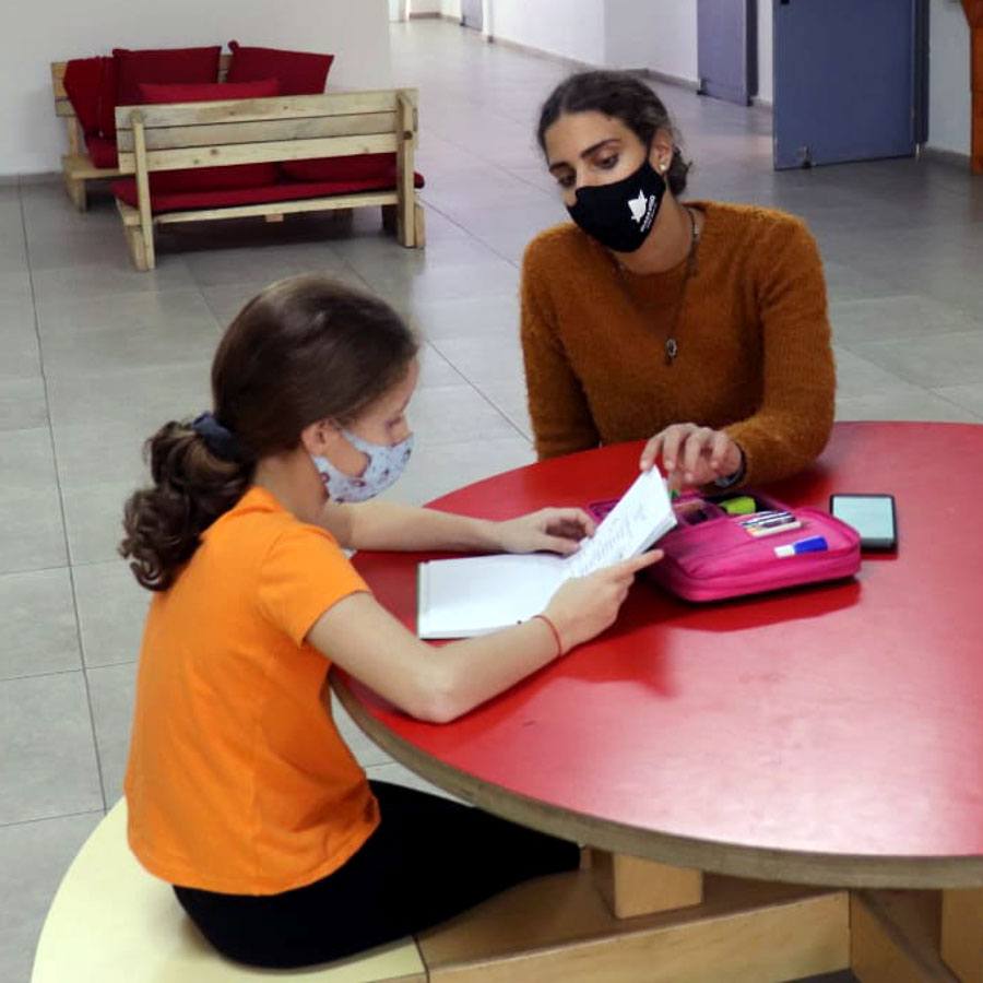 Ortal with a student
