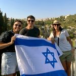 Matan with an Israeli flag leading an Ulpan Etzion activity Matan with an Israeli flag leading an Ulpan Etzion activity | Image provided by Matan